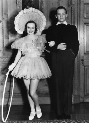 Joan Crawford and Douglas Fairbanks Jr. I'm loving the outfit!