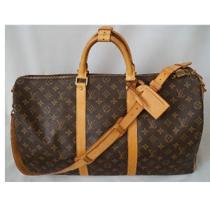 Source: http://www.designer-vintage.com/Louis+Vuitton/Luggage ...