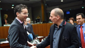 Eurogroup President Jeroen Dijsselbloem (L) shakes hands with Greece's ...