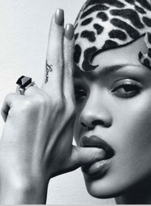 Exploring Rihanna's Tattoos (20 pics)
