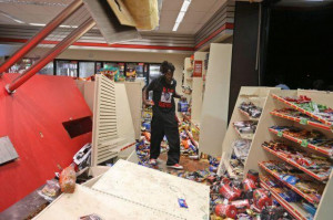 One of the Thiefs looting a store in Missouri is wearing a RIP Trayvon ...