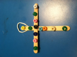 For this Easter Cross craft, supplies needed are yarn, popsickle ...