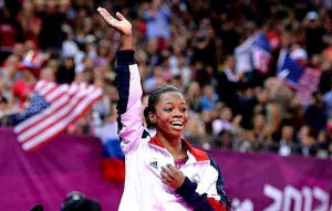 Gabrielle Douglas gestures to the crowd after winning the women’s ...