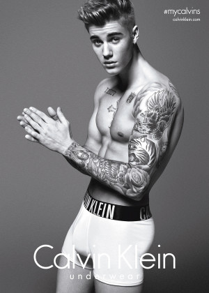 Justin Bieber strips down to his underwear, bares his abs for the new ...