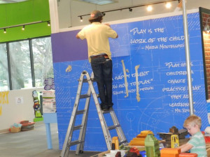 Installing our new quotes wall.