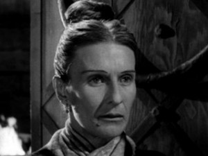 Mrs. Slydes frightens a guest in House on Haunted Hill .