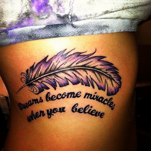 36. Feather inspiring quote tattoo