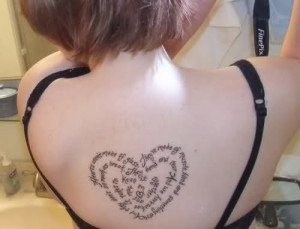 Heart Quote Tattoo On Upper Back