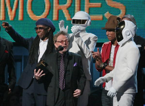 ... Nile Rodgers, left, a Daft Punk member, Pharrell Williams and the