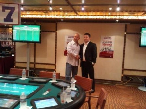 Chris Moneymaker greets eventual 2011 100 000 Carnival PokerPro