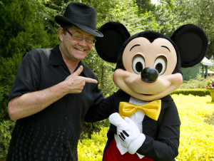 with Mickey Mouse before appearing in concert during the final weekend ...