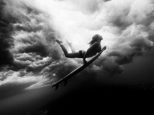 Photo: Surfer Coco Ho photographed beneath a wave
