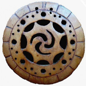 ... gorget is an ancient symbol worn by the members of the Creek Wind Clan