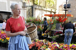 Queen Margrethe II of Denmark walks along the market of Caix-Luzech ...