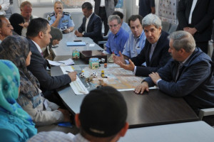 Kerry meets with Syrian refugees at camp in Jordan