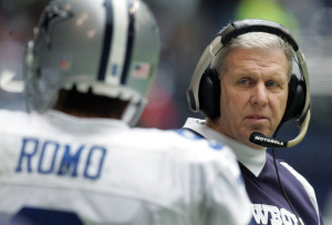 Dallas head coach Bill Parcells eyes Tony Romo on the sideline after a ...