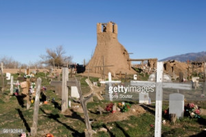 Stock Photo USA New Mexico Taos Taos Pueblo cemetery and church