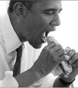 Barack Obama eats a sandwich while visiting Kasalta Bakery in Puerto ...