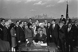 ... Immigration Act of 1965 as Ted and Robert Kennedy, and others look on