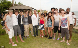 The groups, with mentor Simon Cowell: 1 Direction, Belle Amie and F.Y
