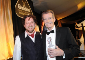 William McIlvanney right winner of the writing award presented by