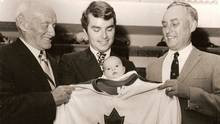 Tom Smythe, centre, introduces son Tom to the Maple Leafs. Looking on ...