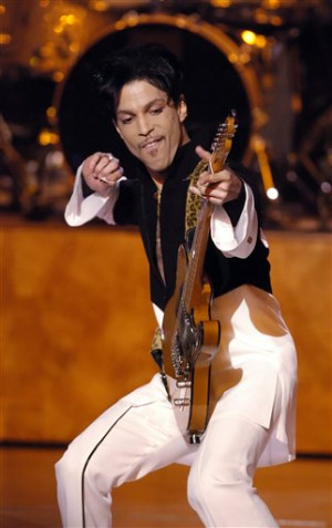 Minneapolis funk legend Prince Rogers Nelson playing guitar