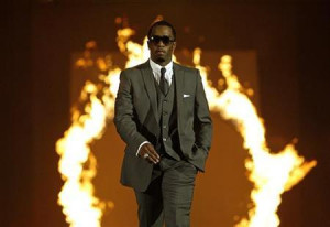 Sean 'P. Diddy' Combs walks on stage at the end of a Sean John fashion ...