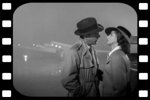 Bogart has on a wonderful fedora, trench coat and tie, if only men ...
