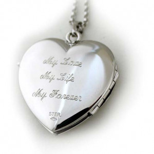 showing a locket with an engraved sentiment saying: 