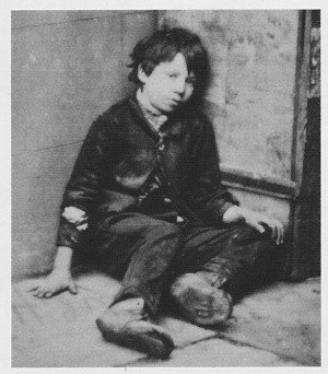 Sad pic of homeless boy in London ca early 1900's.
