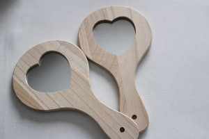 love that these wooden hand mirrors come in several shapes.