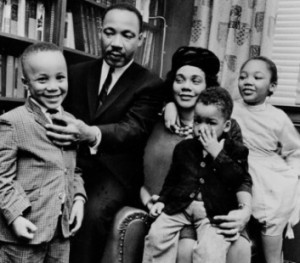 Dr. Martin Luther King Jr. and his wife, Coretta Scott King, sit with ...