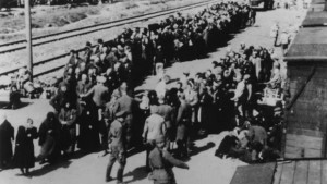 Hungarian Jews arrive at Auschwitz in the Spring of 1944. At the far ...