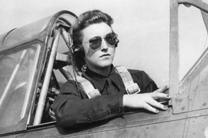 Women's Airforce Service Pilot (WASP) sits in the cockpit of her ...