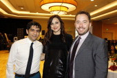 Arash Ferdowsi Bita Daryabari and and Drew Houston pose for a