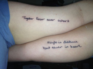 Mother - daughter tattoo in each others handwriting. 