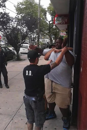 ... dad Eric Garner; cop who used chokehold is stripped of shield, gun