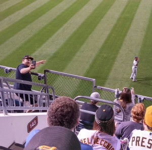 Torii Hunter taking a selfie with a fan during the Twins v Pirates ...