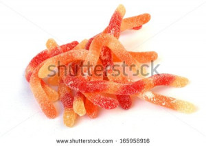 stock-photo-sweet-and-sour-gummy-worm-candy-165958916.jpg