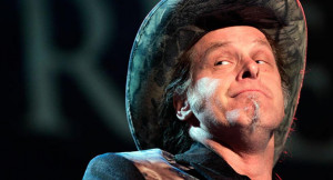 Ted Nugent is shown performing at a concert. | AP Photo