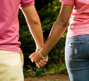 teens-holding-hands