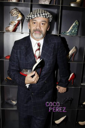 The bottom of Yves Saint Laurent 's shoes have Christian Louboutin ...