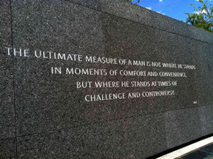 of Martin Luther King Jr.'s famous quotes is inscribed along a wall ...