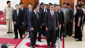 Prime Minister Hun Sen and CNRP president Sam Rainsy leave a meeting ...
