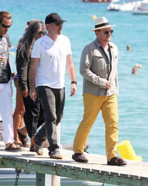 U2's four band members—lead singer Bono, lead guitarist “Edge ...
