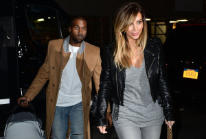 Kayne West and Kim Kardashian walk with their daughter, North, on Nov ...