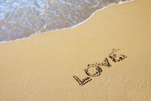 Word Love In Sand by Petr Kratochvil