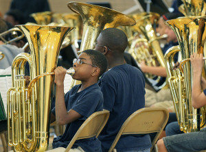 Marietta Sixth Grade Academy Principal Gabe Carmona accepts the 2013 ...