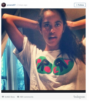 ... she’s wearing a T-shirt supporting an anti-white gangster rap group